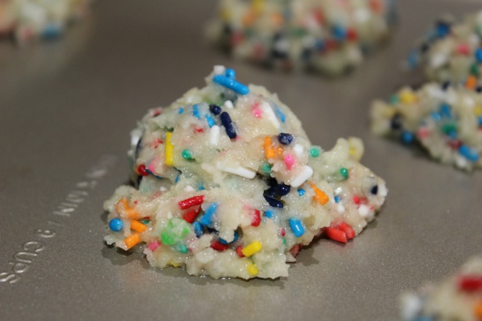 Funfetti Cake Batter cookies scooped on cookie sheet 