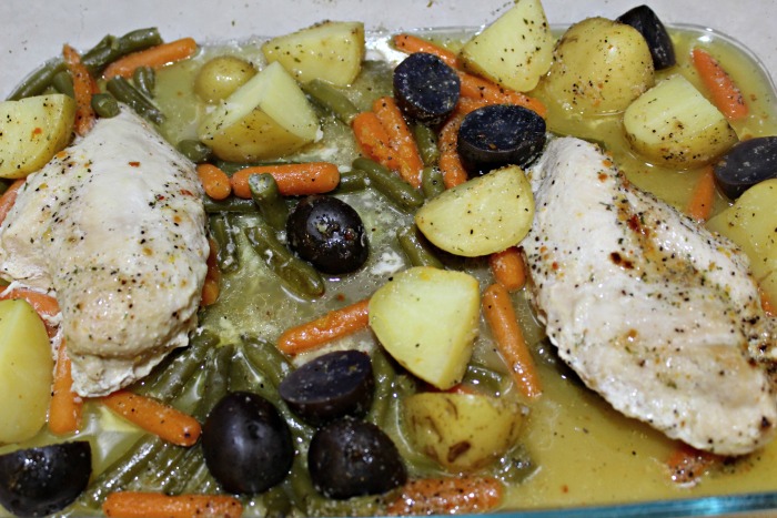 chicken and vegetable bake with melted butter and seasoning baked