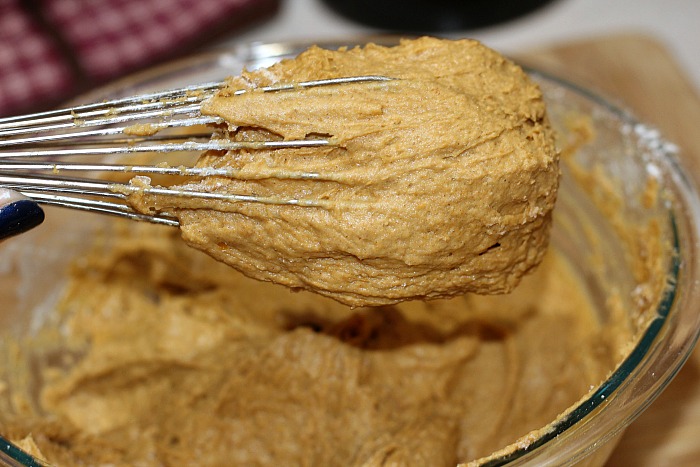 2 Ingredient Pumpkin Cookies batter on a whisk in a mixing bowl