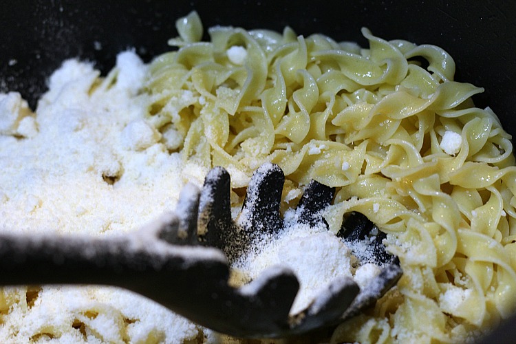 Egg Noodles with Butter and parmesan cheese in a pan 