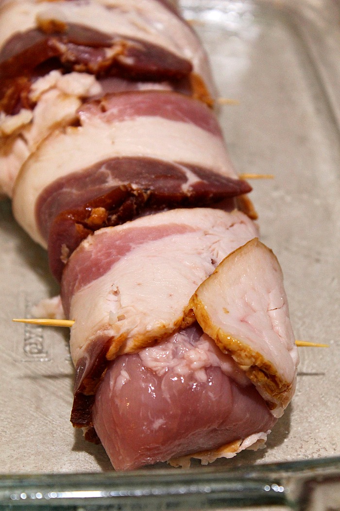 This Bacon Wrapped Pork Tenderloin is the perfect dinner to make!! You can't go wrong with bacon and maple syrup, plus it's easy frugal meal to make as well! 