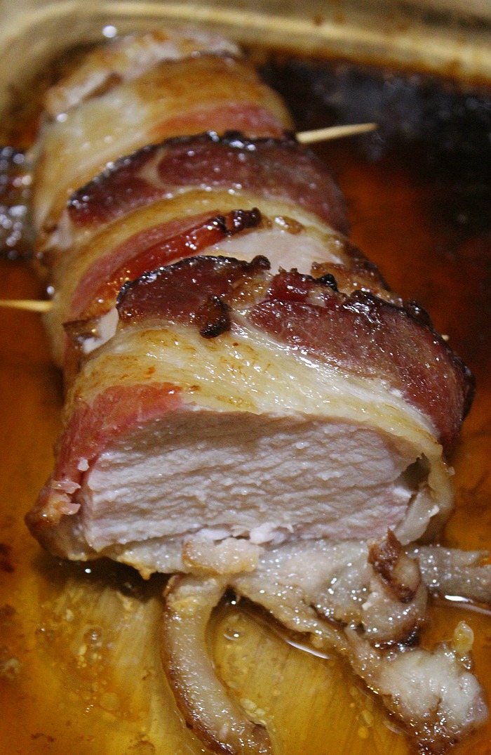 This Bacon Wrapped Pork Tenderloin is the perfect dinner to make!! You can't go wrong with bacon and maple syrup, plus it's easy frugal meal to make as well! 