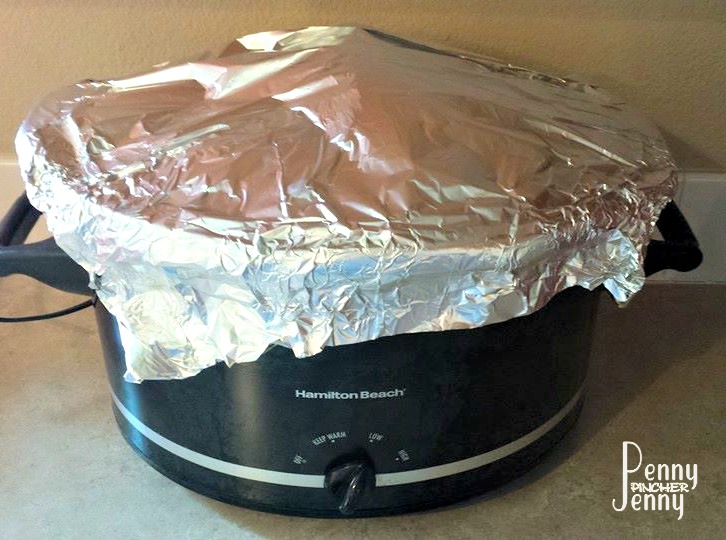 8 quart crockpot with a foil lid to cook a ham in the crockpot