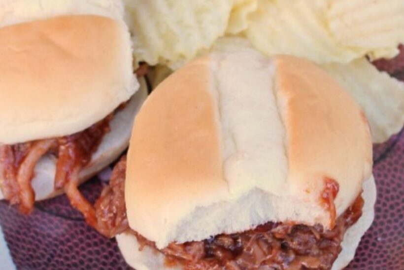 Pulled Pork Sliders on a football plate with chips