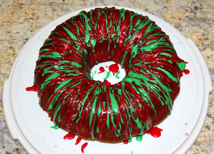 This Christmas Tie Die Cake is a great way to get in the holiday mood! The colors are bright and it's the perfect dessert for a family dinner or potluck. 