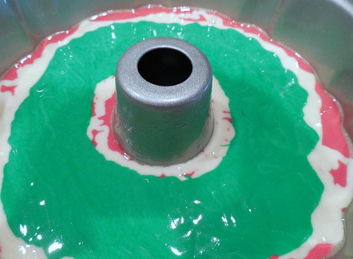 Tie Die Christmas Bundt Cake Batter in bundt pan