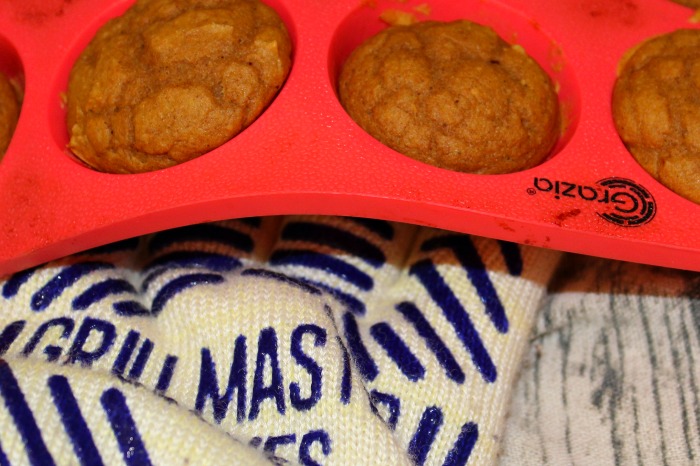 Oven Gloves With Baked Pumpkin Spice Muffins In Silicone Pan 