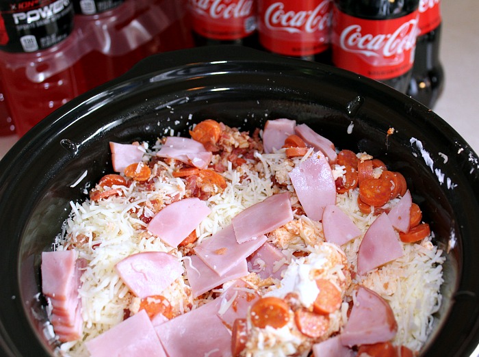 Slow cooker pizza dip in crockpot before cooking
