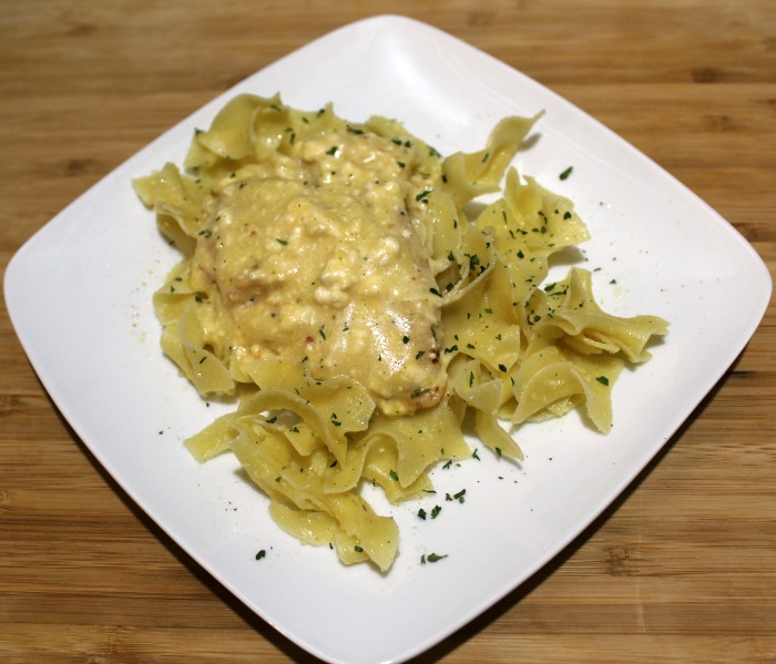 Crock Pot Cream Cheese Chicken served over egg noodle pasta