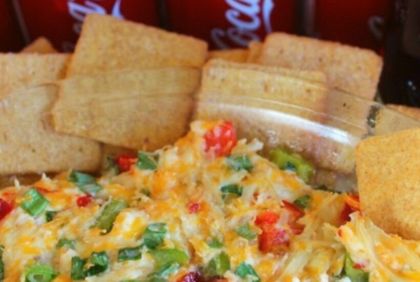 Chicken Quesadilla Dip in dish with Wheat Thins with Coca Cola