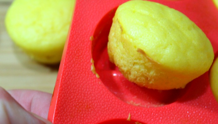 Lemon Weight Watchers Muffins popping out of silicone muffin pans 