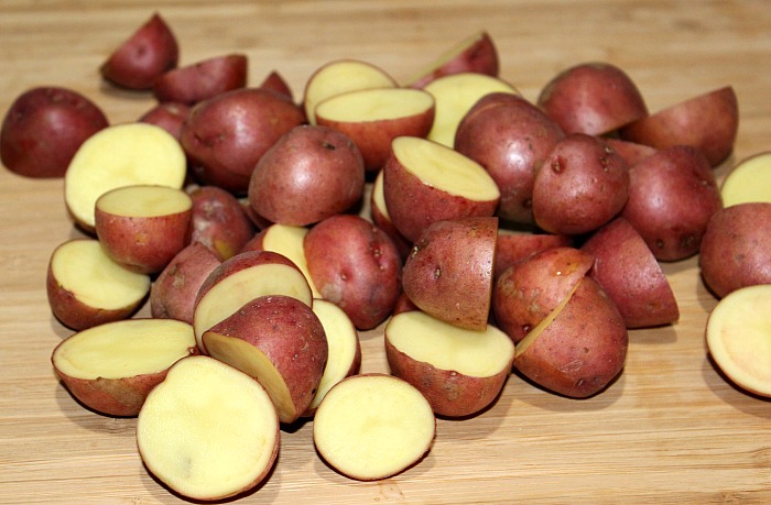 Sliced Red Baby Potatoes On Cutting Board