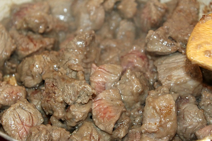 Cooked beef stew meat in frying pan