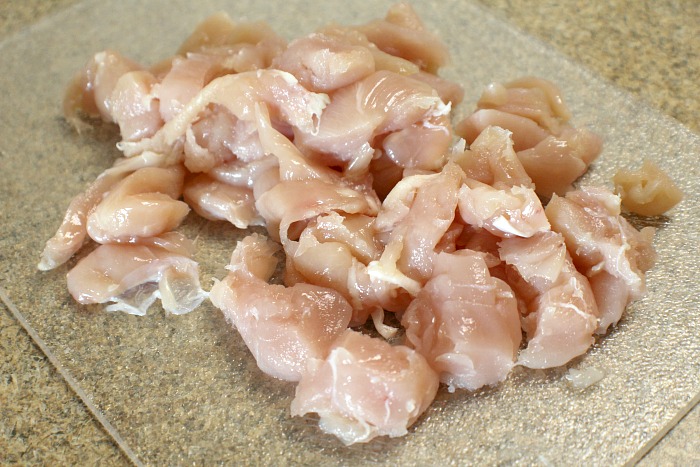 Diced Chicken Breasts on clear cutting board
