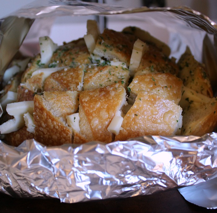 Cheese Stuffed Sourdough round wrapped in foil before  baking