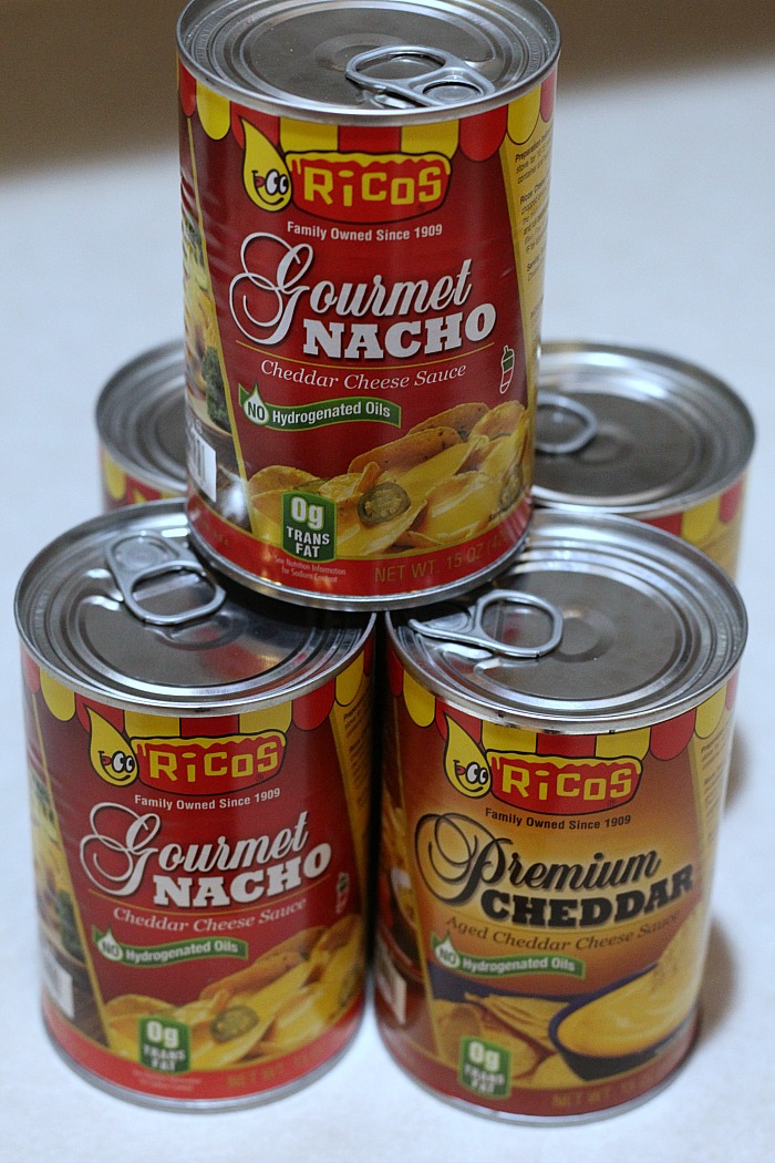 Rico Cheese Cans on a counter 