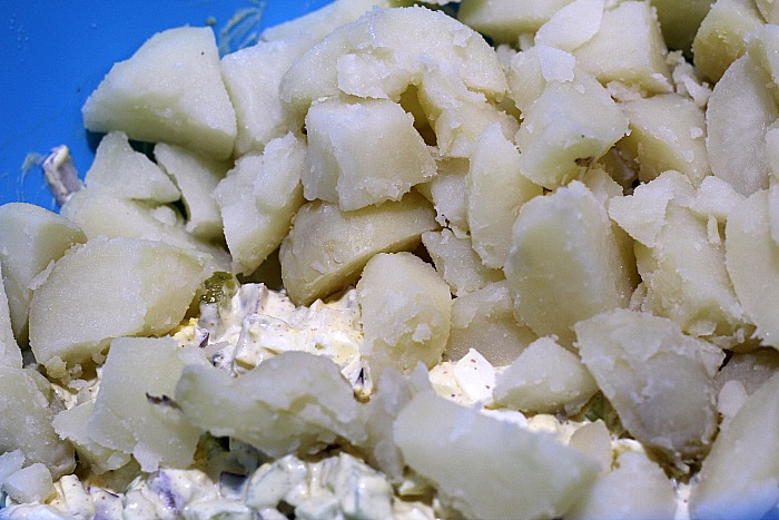 Diced Potatoes In Large Bowl With Mayo Combination 