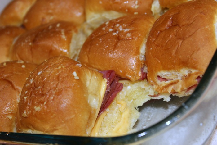 These Easy Hawaiian Roll Sliders are perfect for a quick dinner or they can double as an appetizer for tailgating season as well. Easy to assemble, perfect to take to a friend, and they are frugal too! So many ways to change them up it's never the same meal!