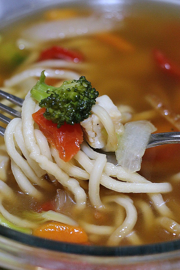 Chicken Chow Mein Soup on fork