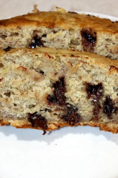 Slicked Chocolate Chip Banana bread on white plate