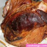 Slow Cooker Ham With Honey And Bourbon On Platter
