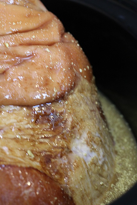 Slow Cooker Ham With Honey And Bourbon Cooking in crockpot 