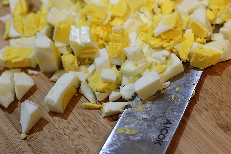 Instant Pot Egg Loaf Diced up on cutting board with knife