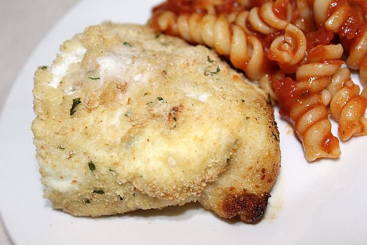 Chicken Parmesan served with Rotini pasta