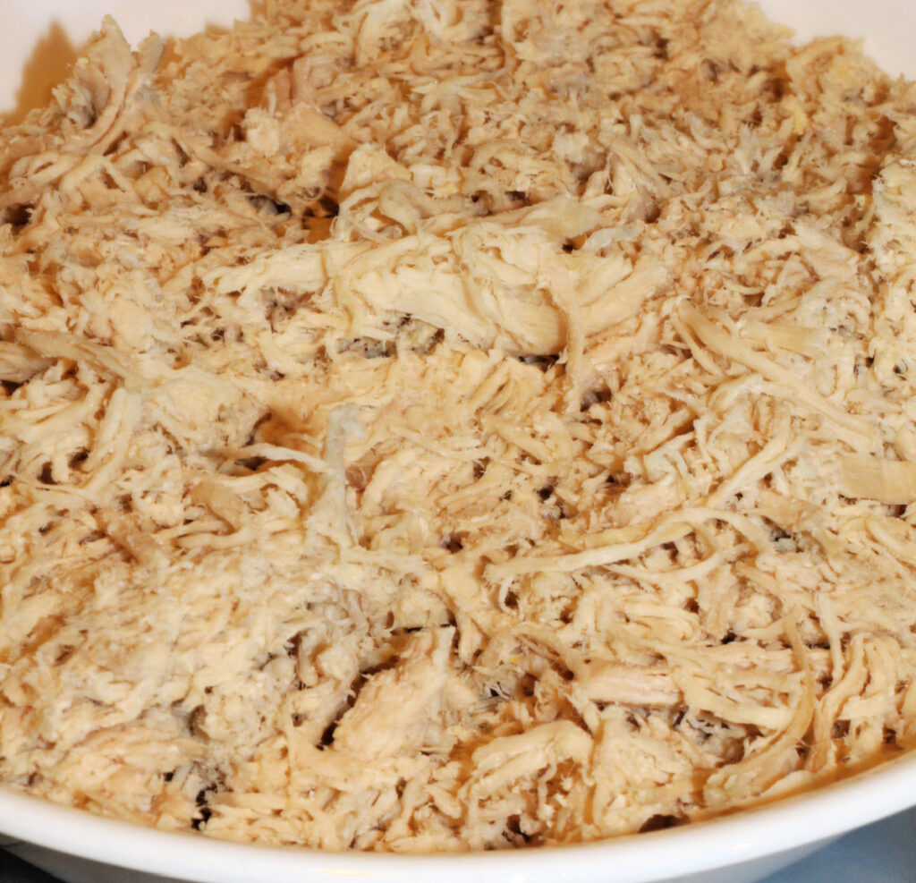 Shredded Chicken in Bowl For Stove Top Chicken Casserole 