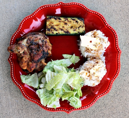 Grilled Zucchini served with white rice, ceasar salad, and grilled chicken thighs
