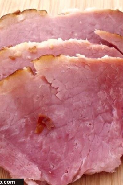 Crockpot Ham Slices on cutting board