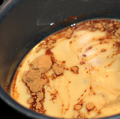 Melted Coconut Oil With peanut butter and cinnamon in sauce pan