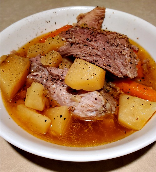 Slow Cooker Pork Roast served in bowl with broth