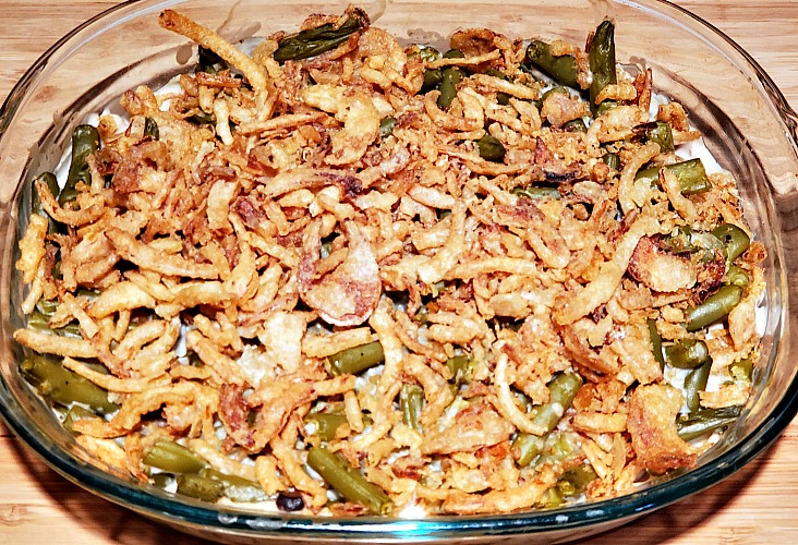 Cooked Green Bean Casserole In Casserole Dish On Cutting Board 