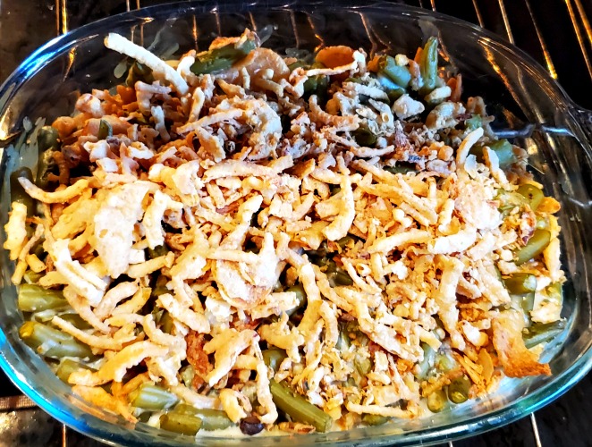 Green Bean Casserole Topped With Crispy Onions In Oven 