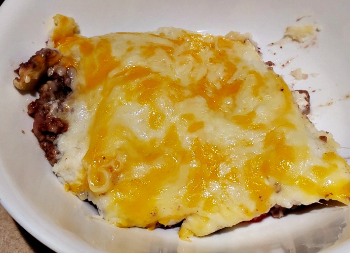 Baked Sheperd's pie Served On white plate