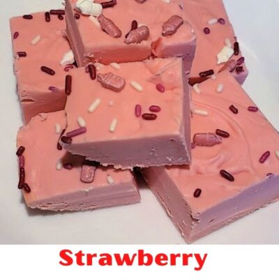 Strawberry 2 Ingredient Fudge With Frosting is perfect to make for a quick get-together, holiday party, or baby shower! Just use frosting and white chocolate chips to microwave this treat! An easy no-bake dessert that is perfect to make in the summer months!