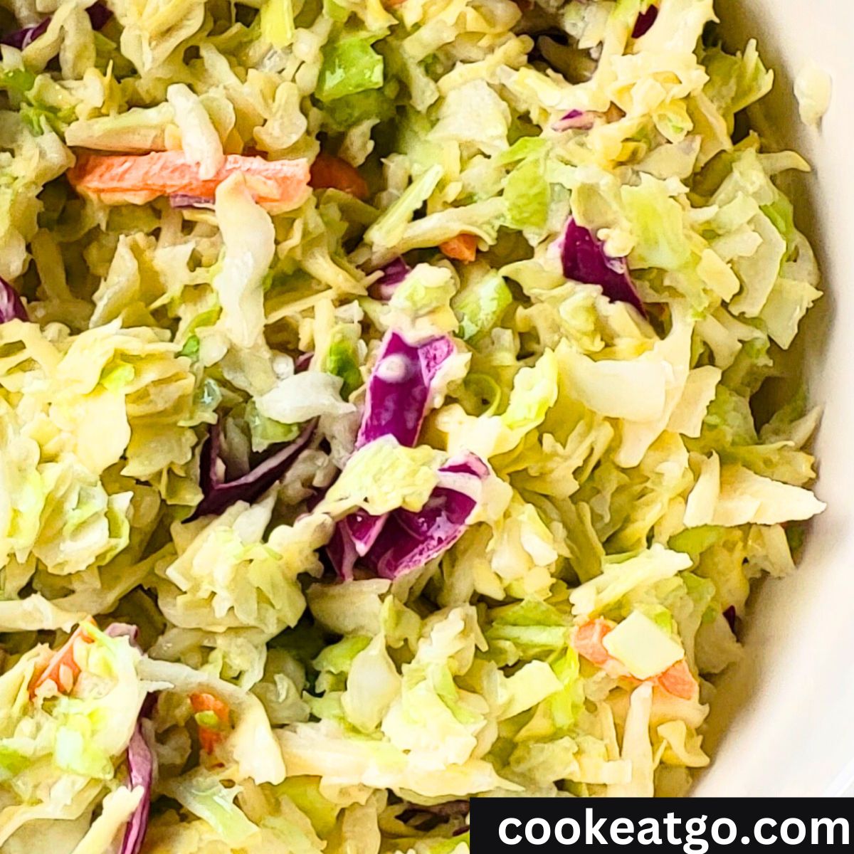 4 Ingredient Coleslaw mixed in a serving bowl