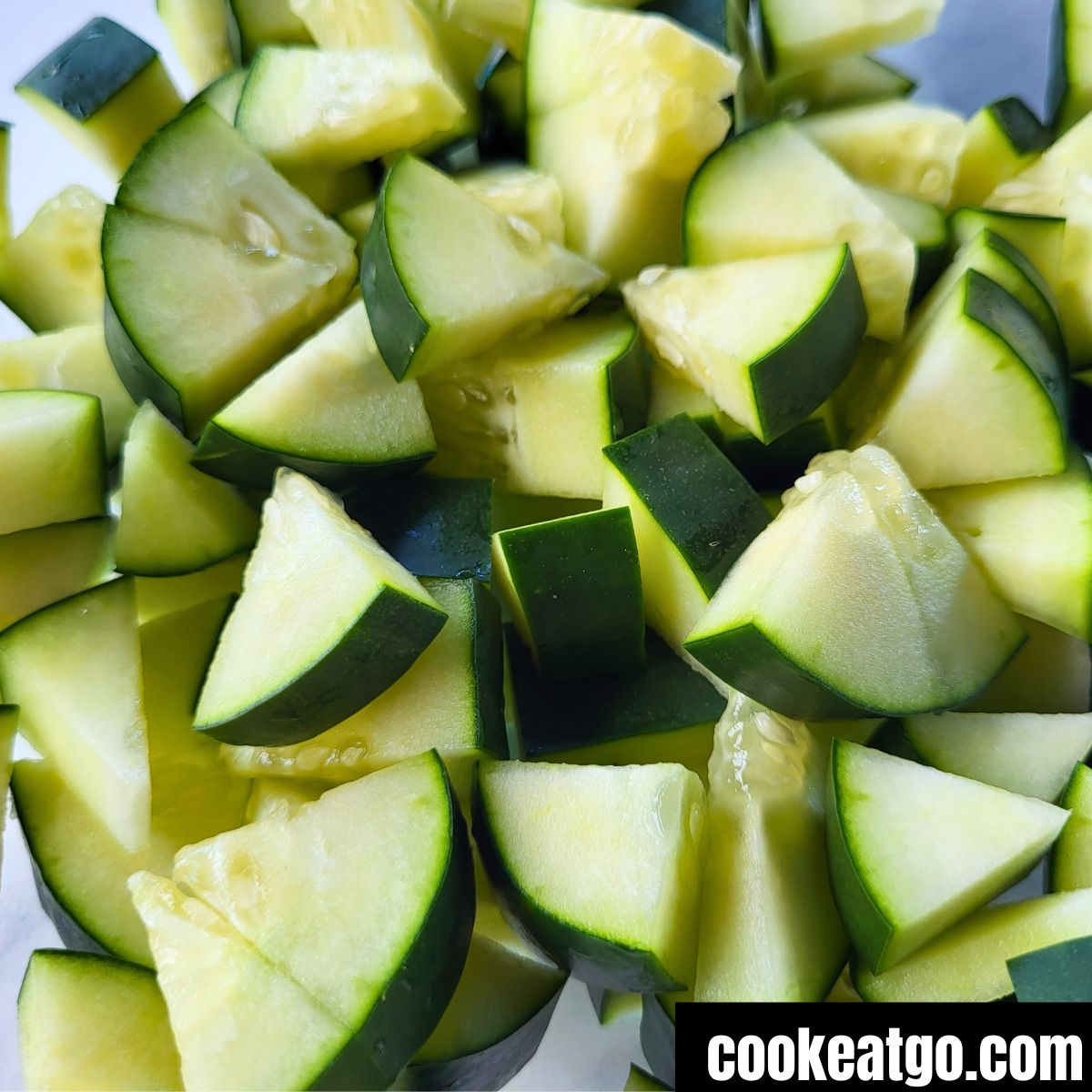Diced cucumbers for cucumber salad in a bowl