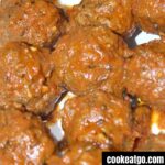 Homemade Meatballs In Spaghetti Sauce on a plate