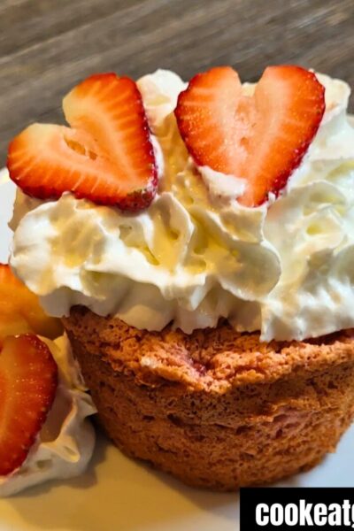 2 Ingredient Strawberry Angel Food Cake Seved with whipped topping and sliced strawberries