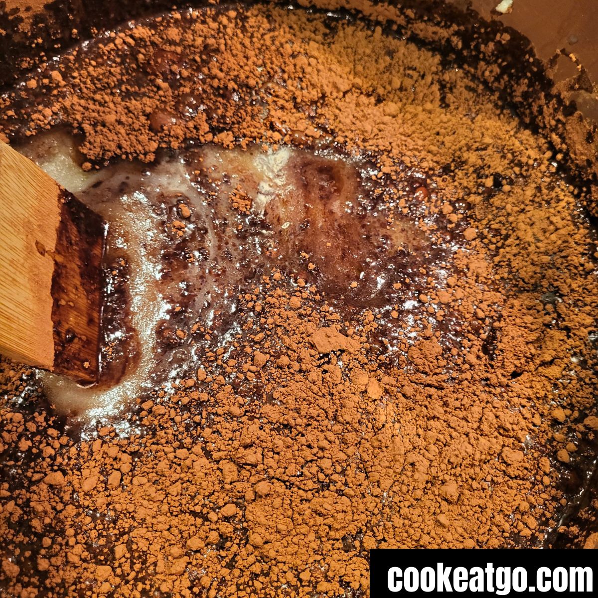Milk, sugar, and Butter melted in a sauce pan with coca powder added to it
