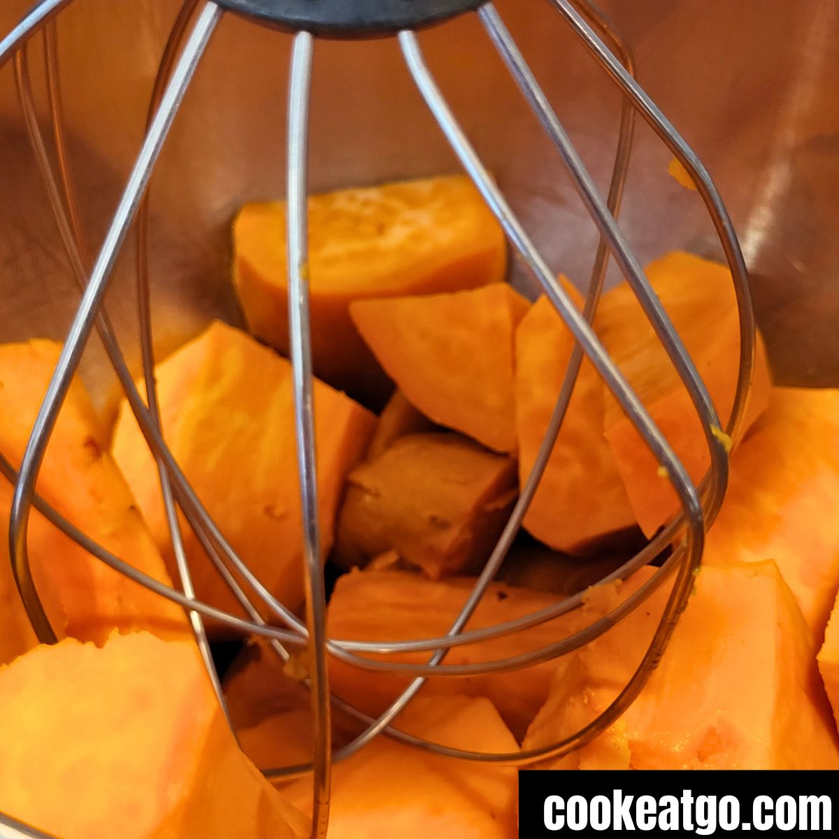 Cubed Sweet Potatoes In Mixer Before Mashing