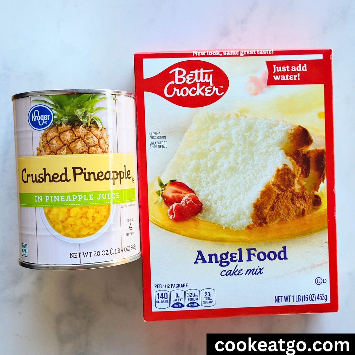 Can of crushed pineapple next to a box of angel food cake mix