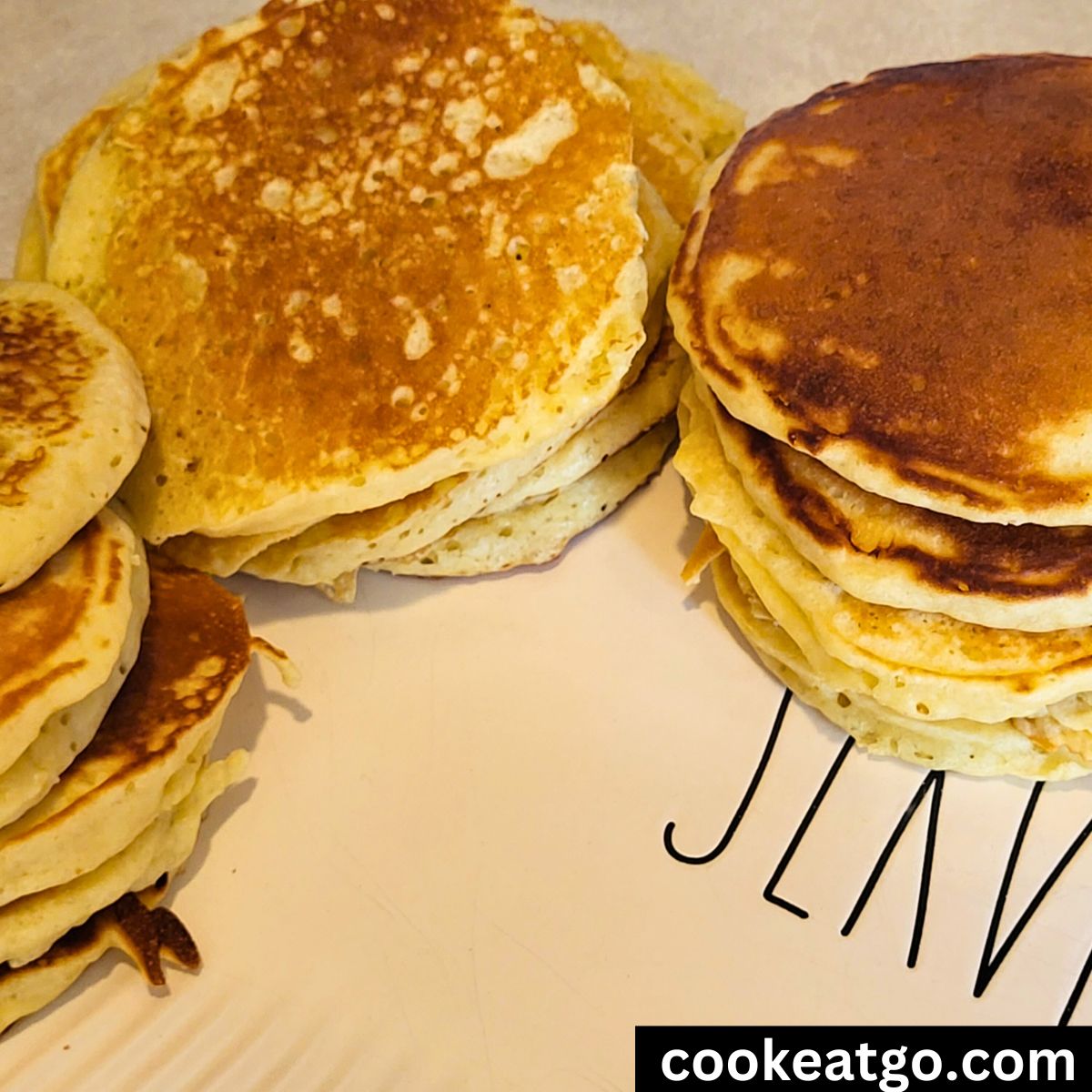 3 stacks of homemade pancakes on a platter