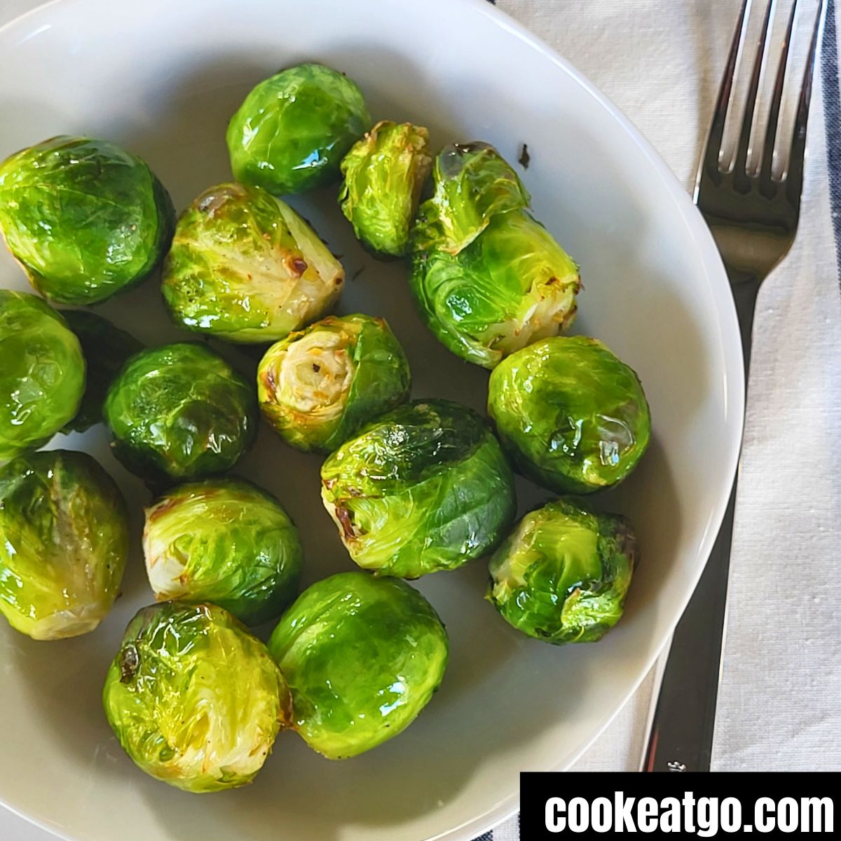 Weight Watchers Air Fryer Brussel Sprouts Served on a white plate