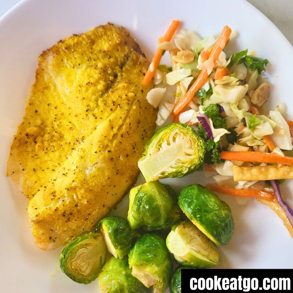 Weight Watchers Air Fryer Tilapia served with brussel sprouts with asian salad