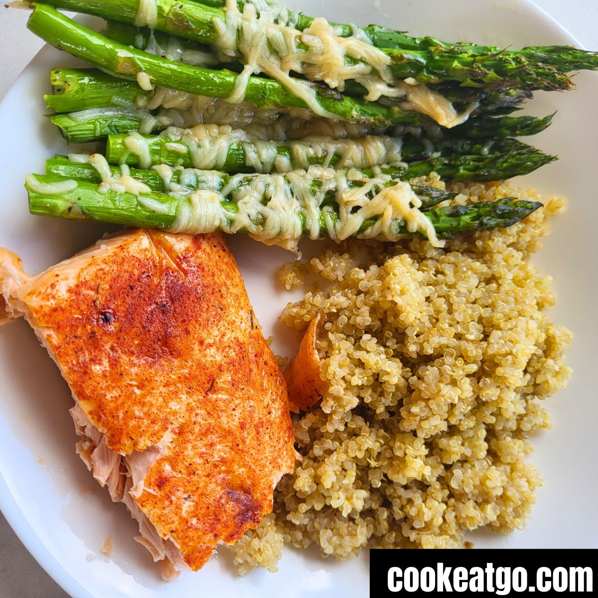 Oven Roasted Parmesan Asparagus served with air fryer salmon and crockpot quiona