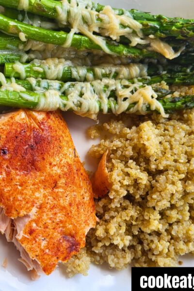 Weigth watchers Air Fryer Salmon Served on white plate with Quinoa and asparagus