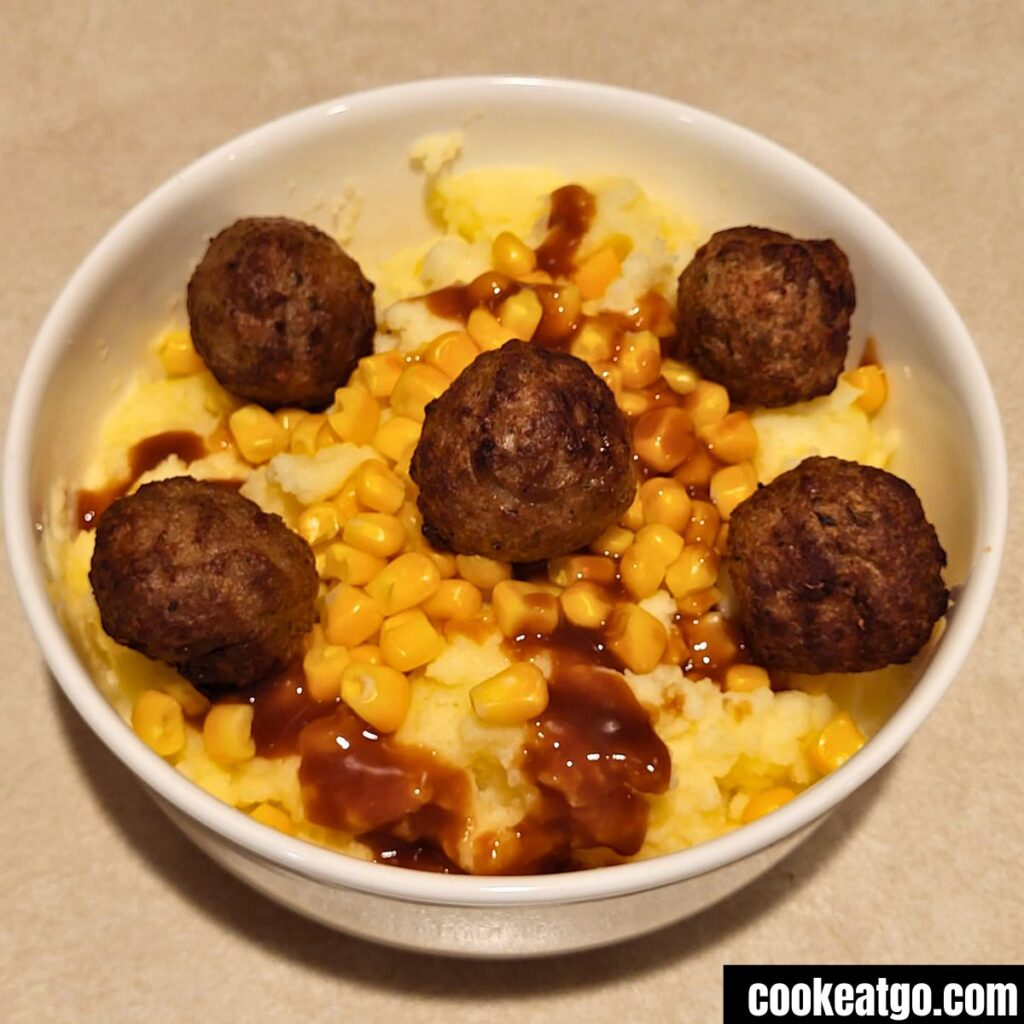 Mashed Potato Meatball bowl served in a white bowl